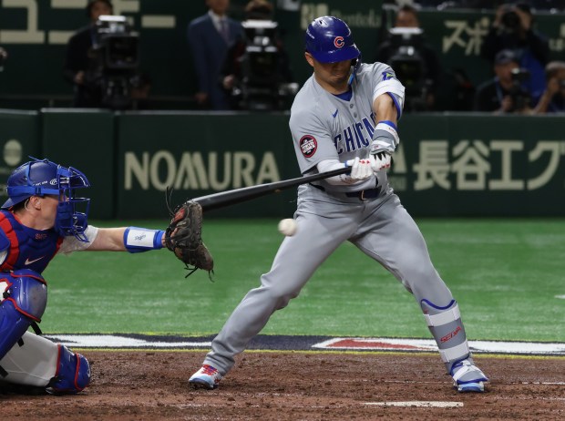 Cubs designated hitter Seiya Suzuki strikes out swinging to end...