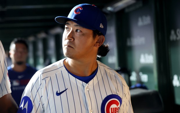 Chicago Cubs starting pitcher Shota Imanaga (18) walks through the dugout after finishing up the fifth inning of a game against the Atlanta Braves at Wrigley Field in Chicago on Sept. 2, 2025. (Chris Sweda/Chicago Tribune)