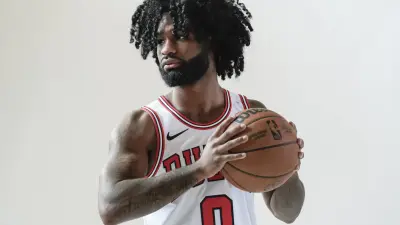 Sep 29, 2025; Chicago, IL, USA; Chicago Bulls guard Coby White (0) poses for photos during Chicago Bulls Media Day.
