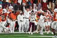 Texas Longhorns head coach Steve Sarkisian celebrates a interception late in the 4th quarter...