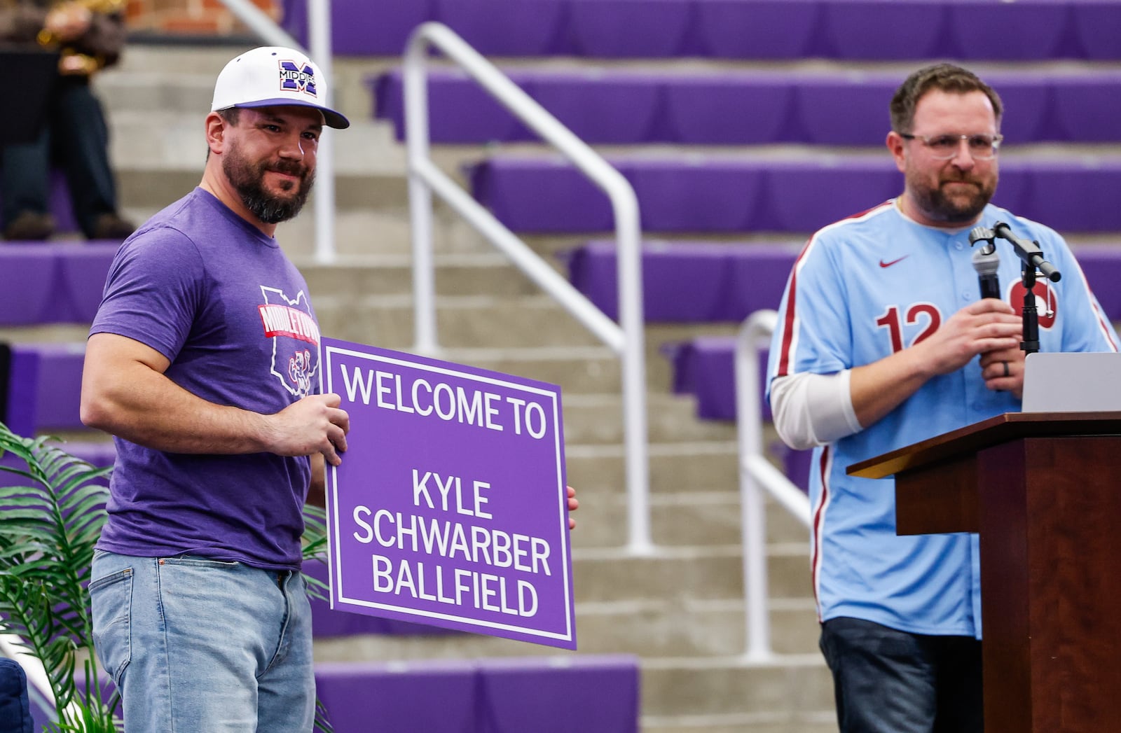 Middletown native and Major League Baseball player Kyle Schwarber returned to Middletown High School for an event at Wade E. Miller Arena Wednesday, Nov. 19, 2025. The “Beyond the Field with Kyle Schwarber” night gave a crowd of baseball fans a chance to hear Schwarber talk about baseball, family and giving back to the community during the event. Vice Mayor Steve West presented Schwarber with signage for a field named after him and signs that will be installed at city entrances. NICK GRAHAM/STAFF