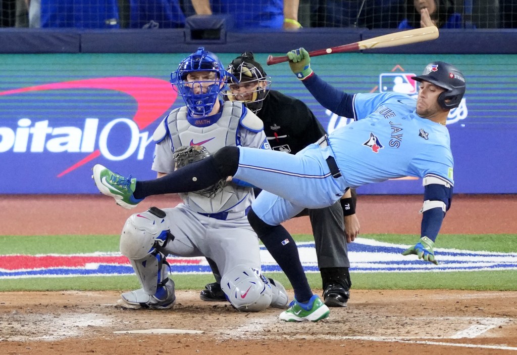 George Springer, who had two hits on the night, barely avoids getting hit by a pitch during the eighth inning of the Blue Jays' 3-1 loss to the Dodgers in Game 6 of the World Series on Oct. 31, 2025.