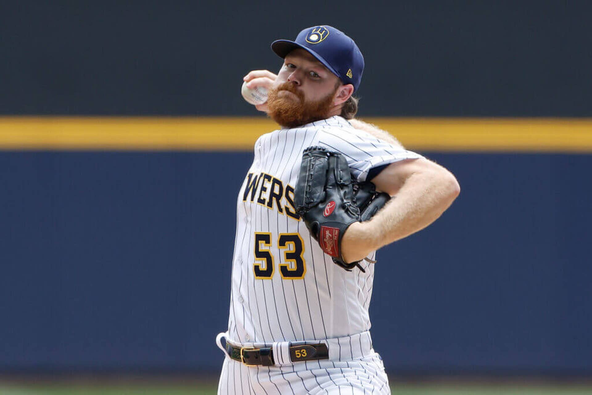 MILWAUKEE, WISCONSIN - AUGUST 06: Brandon Woodruff #53 of the Milwaukee Brewers throws a pitch in the first inning against the Pittsburgh Pirates at American Family Field on August 06, 2023 in Milwaukee, Wisconsin. (Photo by John Fisher/Getty Images)