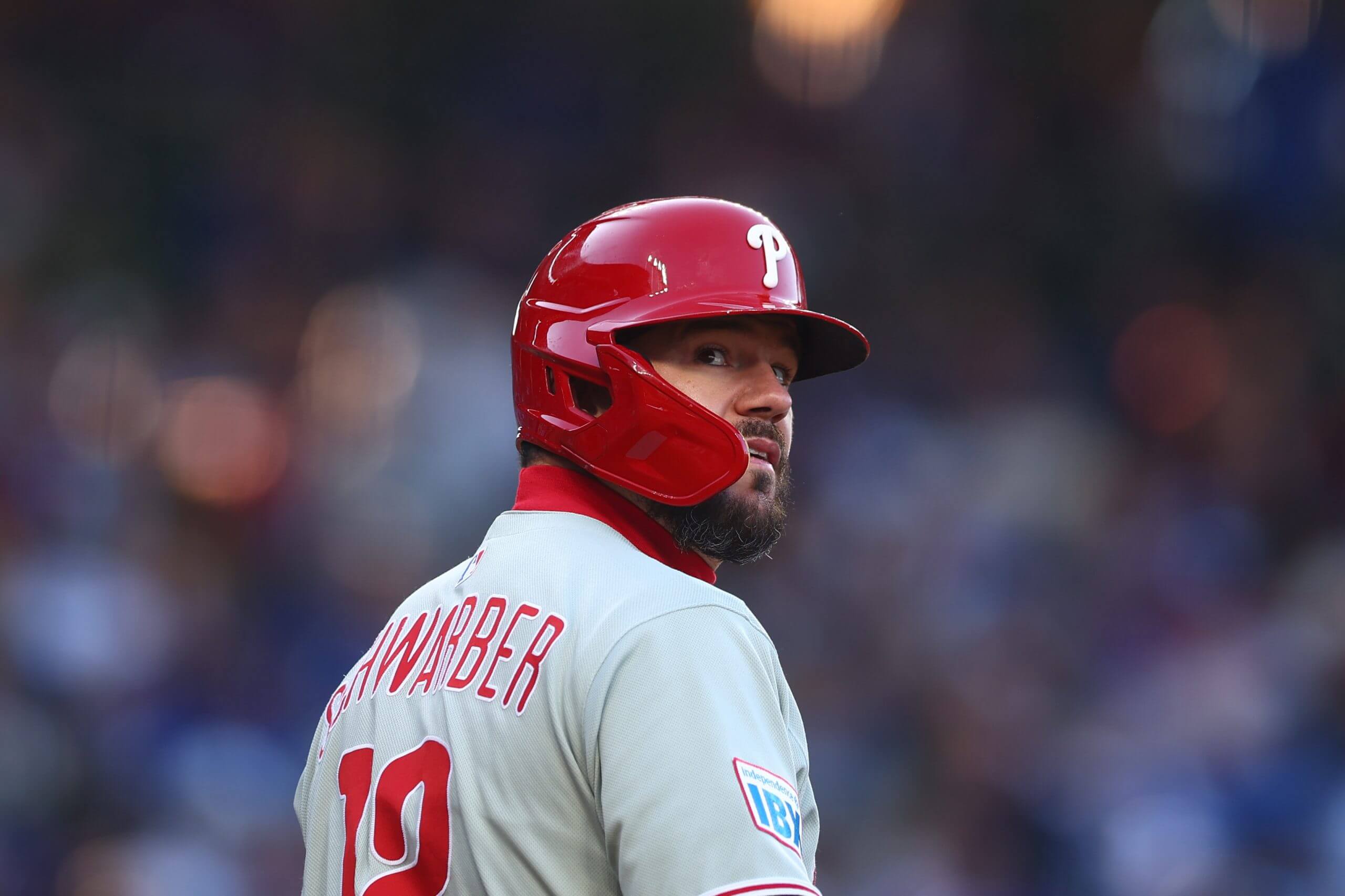 Kyle Schwarber looks up to his right at Wrigley Field