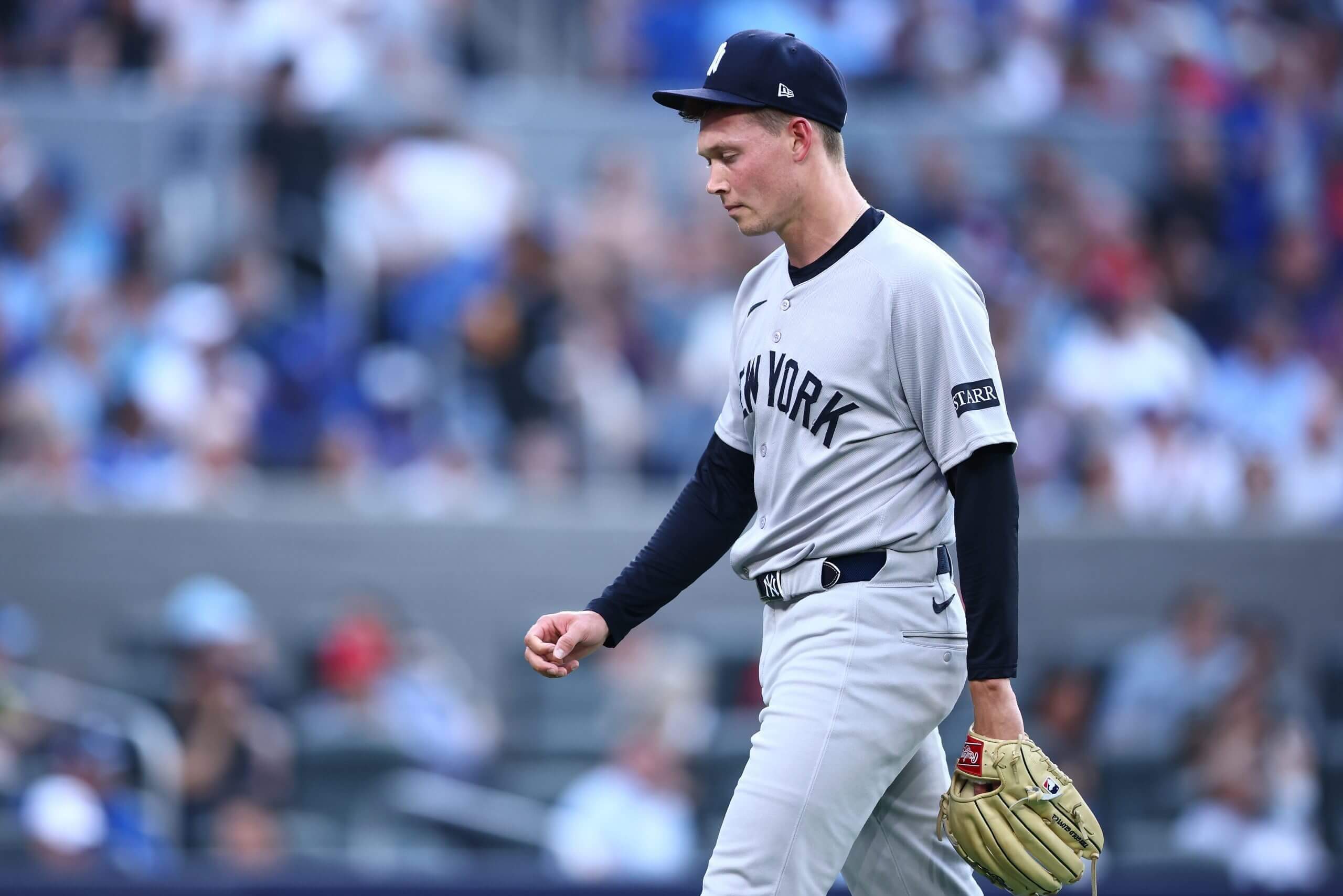 Will Warren leaves the field at the end of the first inning.