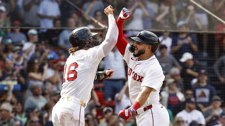 BOSTON, MA - AUGUST 17: Wilyer Abreu #52 of the Boston Red Sox is congratulated by Jarren Duran #16 after Abreu hit a two-run home run against the Miami Marlins during the fourth inning at Fenway Park on August 17, 2025 in Boston, Massachusetts. (Photo By Winslow Townson/Getty Images)
