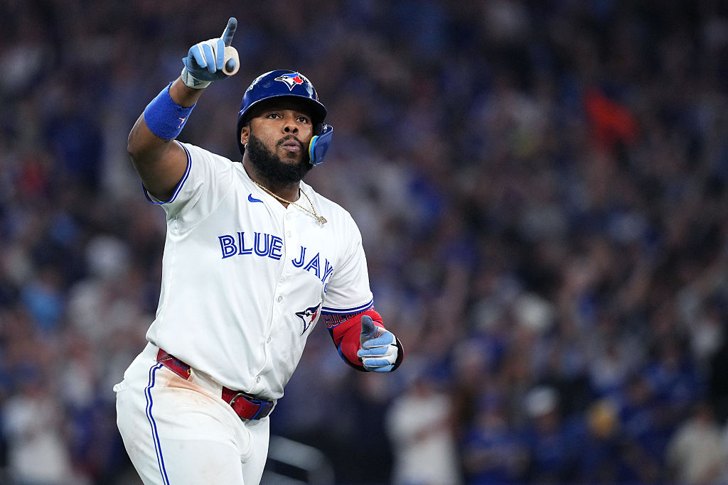 TORONTO, ONTARIO - OCTOBER 19: Vladimir Guerrero Jr. #27 of the Toronto Blue Jays rounds the bases after hitting a home run against the Seattle Mariners during the fifth inning in game six of the American League Championship Series at Rogers Centre on October 19, 2025 in Toronto, Ontario. (Photo by Mark Blinch/Getty Images)