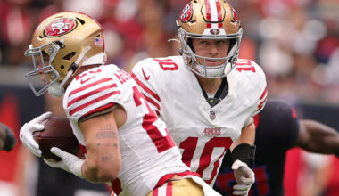 HOUSTON, TEXAS - OCTOBER 26: Mac Jones #10 of the San Francisco 49ers hands the ball to Christian McCaffrey #23 in the first quarter of the game against the Houston Texans at NRG Stadium on October 26, 2025 in Houston, Texas. (Photo by Alex Slitz/Getty Images)