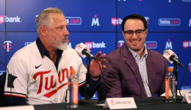 Manager Derek Shelton #8 of the Minnesota Twins addresses media as Vice President and Assistant General Manager Jeremy Zoll looks on during a press conference at Target Field on November 04, 2025 in Minneapolis, Minnesota.