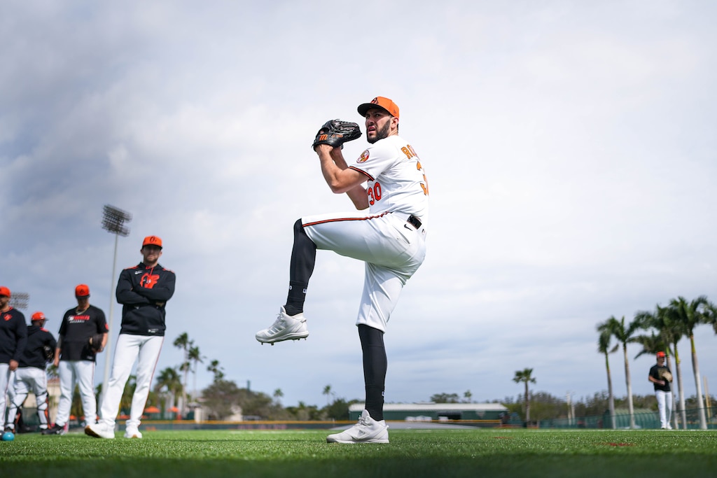 Baltimore Orioles pitcher Grayson Rodriguez (30) warms up ahead of a bullpen session during Spring Training at Ed Smith Stadium in Sarasota, Fla. on Saturday, February 22, 2025.