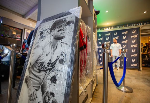A poster of the Los Angeles Dodgers’ Miguel Rojas is...