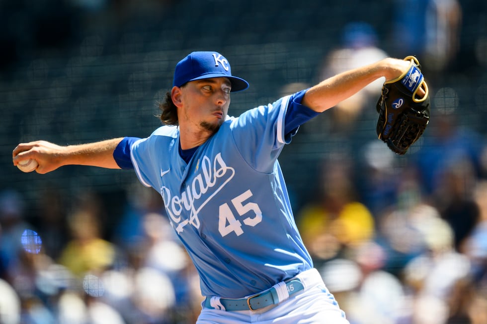 FILE - Kansas City Royals starting pitcher Taylor Clarke throws to a Boston Red Sox batter...