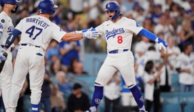Los Angeles Dodgers' Kiké Hernandez (8) celebrates with teammates Ben Rortvedt (47) and Andy Pages after hitting a two-run home run during the second inning of a baseball game against the Philadelphia Phillies Tuesday, Sept. 16, 2025, in Los Angeles. (AP Photo/Mark J. Terrill)