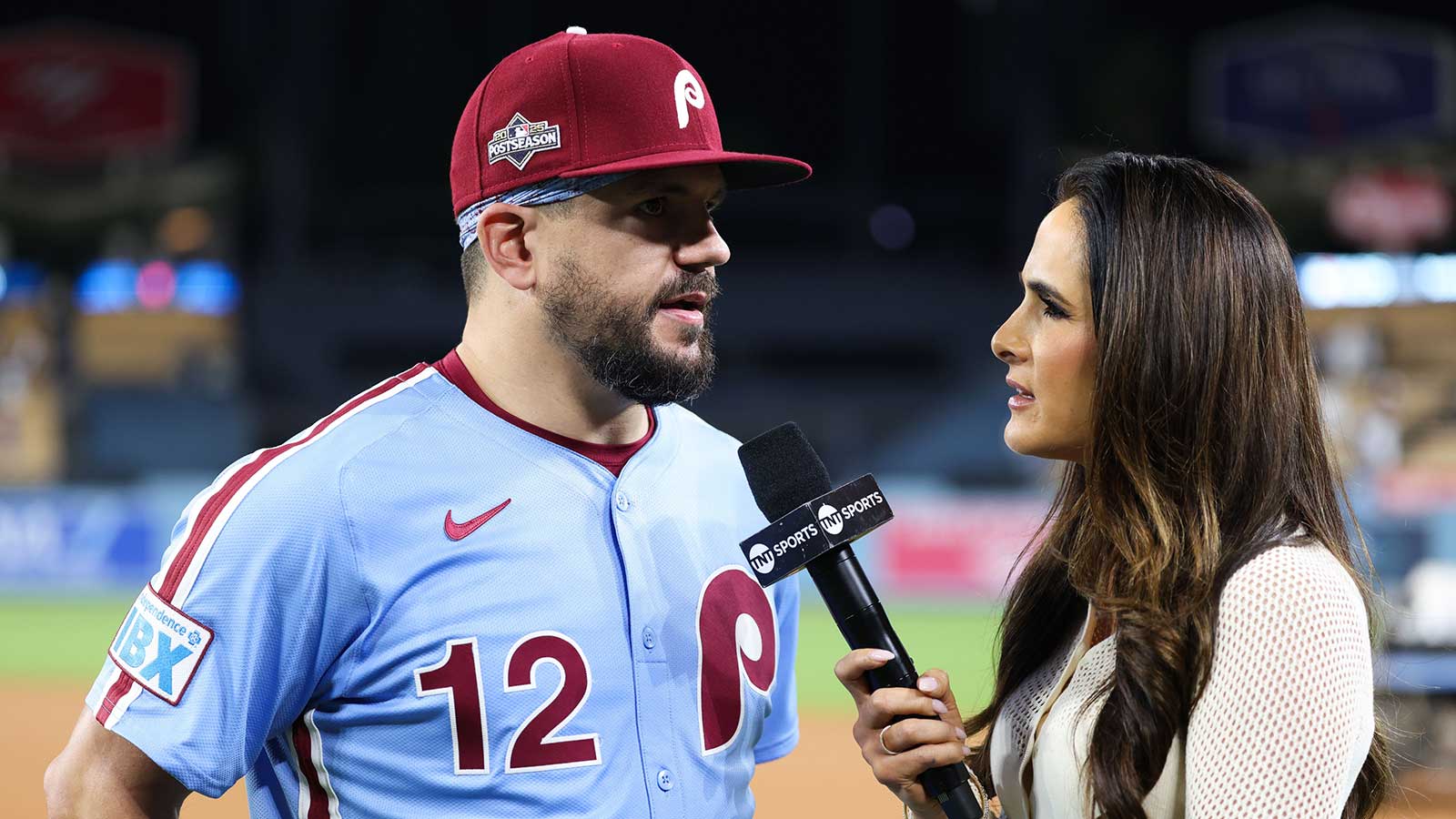 Philadelphia Phillies designated hitter Kyle Schwarber (12) speaks to the media after the game against the Los Angeles Dodgers during game three of the NLDS round for the 2025 MLB playoffs at Dodger Stadium. 