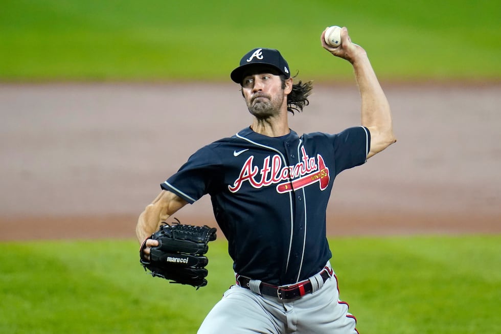 FILE - Atlanta Braves starting pitcher Cole Hamels throws a pitch to the Baltimore Orioles...