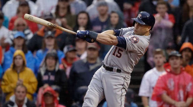 In this Oct. 9, 2017, file photo, Houston Astros designated hitter Carlos Beltran takes a swing during the ninth inning of Game 4 of baseball's American League Division Series in Boston. (AP Photo/Charles Krupa, File)