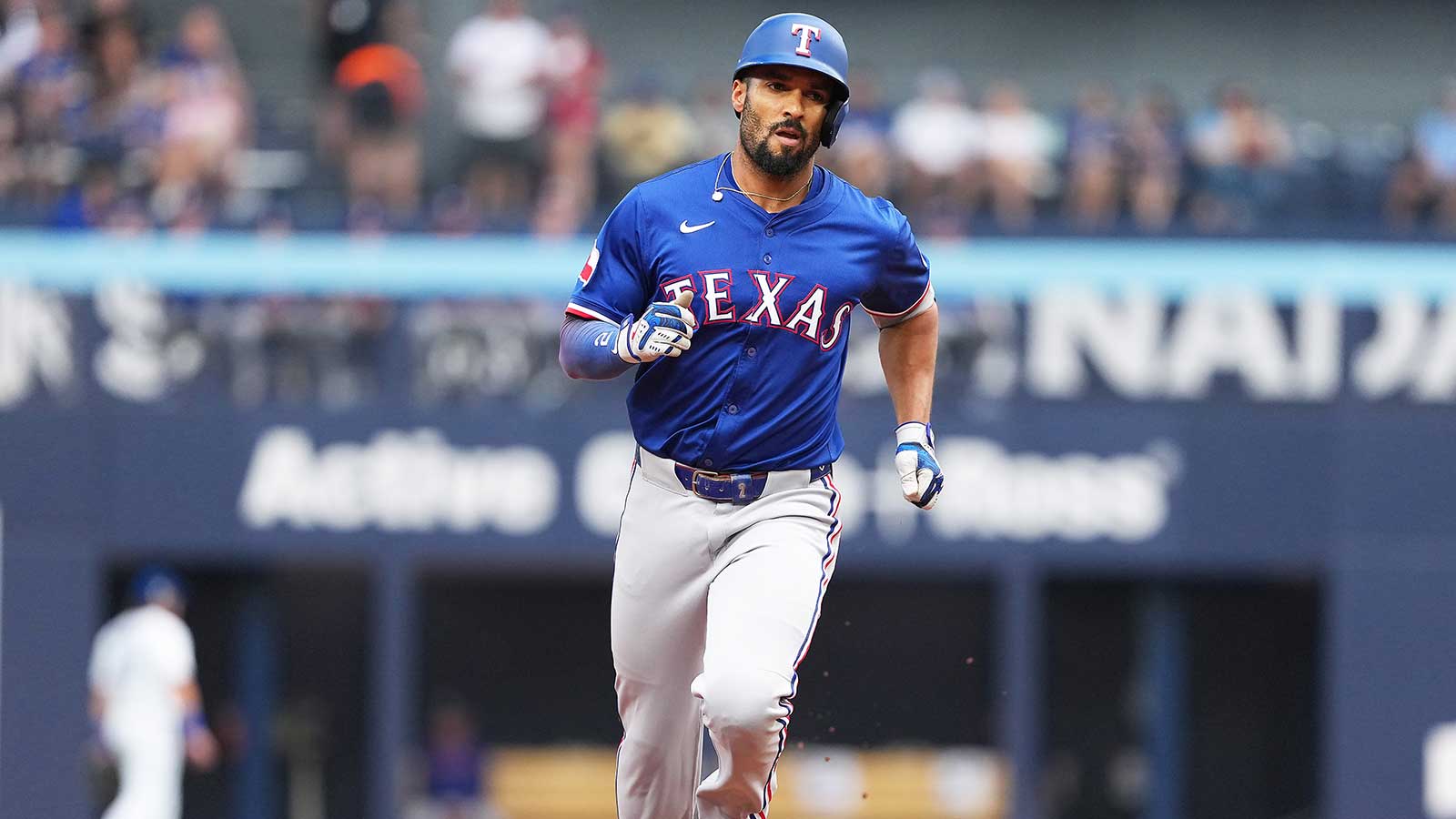 Texas Rangers second baseman Marcus Semien (2) runs the bases after hitting a two run home run against the Toronto Blue Jays during the second inning at Rogers Centre.