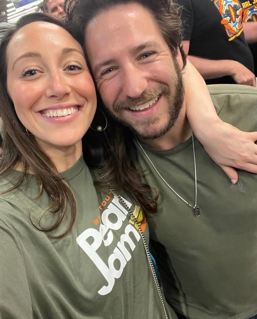 Emily and Jared Sandler, Jared pictured with the chain that symbolizes the babies the couple...