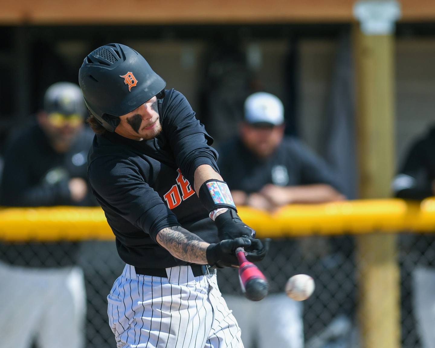 DeKalb's Cole Latimer (5) makes contact with the ball during the game on Saturday May 3, 2025, while traveling to take on Sycamore High School held at Sycamore Park District Sports Complex.