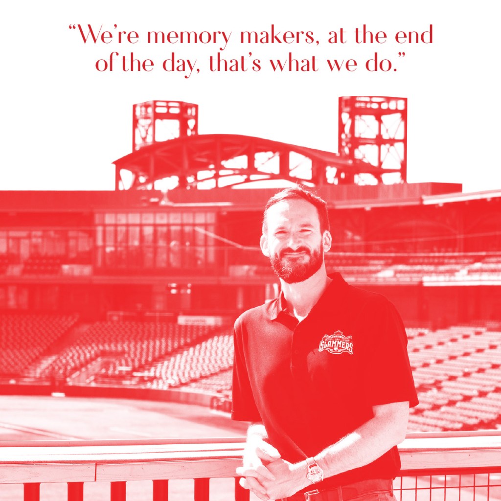 a red and white photo of Night Train standing in a baseball stadium, the field and stands behind him. He leans back over a railing and smiles at the camera. At the top is a quote that reads: "We're memory makers, at the end of the day, that's what we do."