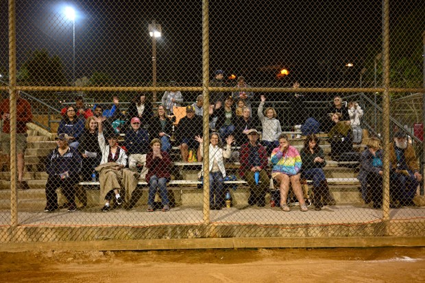 One of two sections of families, friends, and fans showed...