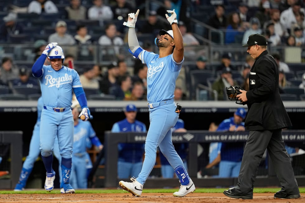 Kansas City Royals' MJ Melendez, right, celebrates his solo home run during the third inning...