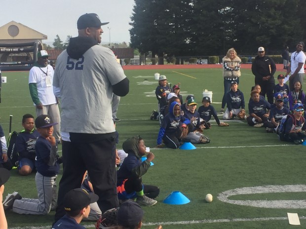 Vallejo native and New York Yankees pitcher CC Sabathia prepares to throw a pitch to campers at his free PitCCh In Foundation Baseball ProCamp. (Thomas Gase - Times-Herald)