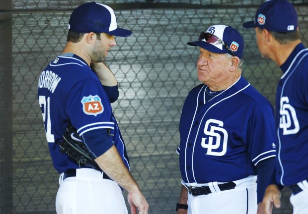San Diego Padres pitcher Brandon Morrow talks with former Padre Randy Jones during a spring training practice. (K.C. Alfred, The San Diego Union-Tribune)