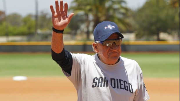 Former Padres pitcher Randy Jones, who is the San Diego Padres Alumni team's manager, waves after he was introduced before the alumni team play the Marines of the MCAS Miramar All-Stars team in a game of softball at Marine Corps Air Station Miramar in San Diego on Thursday. (Hayne Palmour IV/San Diego Union-Tribune)
