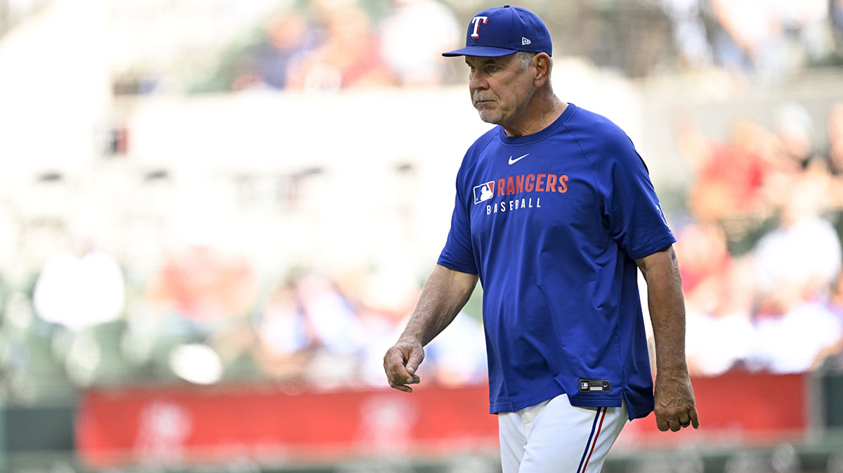 Texas Rangers manager Bruce Bochy (15) walks to the pitchers mound during the game against the Minnesota Twins at Globe Life Field.