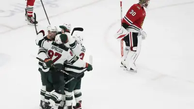 Nov 26, 2025; Chicago, Illinois, USA; Minnesota Wild left wing Kirill Kaprizov (97) celebrates his game winning goal against the Chicago Blackhawks during overtime at United Center.
