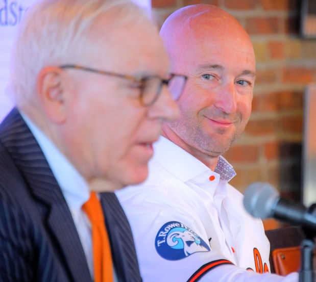 Craig Albernaz, newly hired as manager of the Baltimore Orioles looks at David Rubenstein, control owner during a press conference at Oriole Park at Camden Yards. (Karl Merton Ferron/Staff)