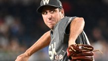 Aug 10, 2024; Washington, District of Columbia, USA;  Washington Nationals relief pitcher Derek Law (58) delivers a pitch during the ninth inning against the Los Angeles Angels at Nationals Park. Mandatory Credit: James A. Pittman-USA TODAY Sports