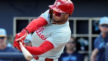 Feb 25, 2025; Port Charlotte, Florida, USA;  Philadelphia Phillies outfielder Justin Crawford (80) breaks his bat as he reaches on a fielders choice against the Tampa Bay Rays during the fourth inning at Charlotte Sports Park. Mandatory Credit: Kim Klement Neitzel-Imagn Images
