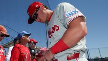 Mar 2, 2025; Dunedin, Florida, USA; Philadelphia Phillies infielder Aidan Miller (81) signs autographs for fans before a game against the Toronto Blue Jays during spring training at TD Ballpark. Mandatory Credit: Nathan Ray Seebeck-Imagn Images