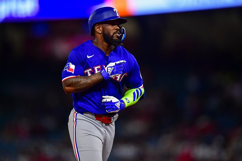 Jul 30, 2025; Anaheim, California, USA; Texas Rangers right fielder Adolis García (53) runs the bases after hitting a two run home run against the Los Angeles Angels during the eighth inning at Angel Stadium. Mandatory Credit: Gary A. Vasquez-Imagn Images