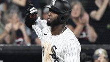 Aug 23, 2025; Chicago, Illinois, USA;  Chicago White Sox outfielder Luis Robert Jr. (88) gestures after he hits a home run during the eighth inning against the Minnesota Twins at Rate Field. Mandatory Credit: Matt Marton-Imagn Images