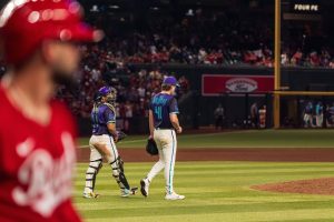 Aug 23, 2025; Phoenix, Arizona, USA; A general view as the Arizona Diamondbacks pitcher Jake Woodford (41) and catcher Gabriel Moreno (14) celebrate after a victory against the Cincinnati Reds at Chase Field. Mandatory Credit: Allan Henry-Imagn Images