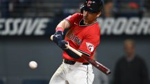 Aug 30, 2025; Cleveland, Ohio, USA; Cleveland Guardians left fielder Steven Kwan (38) hits an RBI single during the eighth inning against the Seattle Mariners at Progressive Field. Mandatory Credit: Ken Blaze-Imagn Images