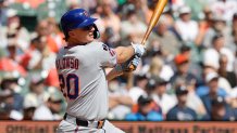 Sep 3, 2025; Detroit, Michigan, USA;  New York Mets player Pete Alonso (20) hits an RBI double in the third inning against the Detroit Tigers at Comerica Park. Mandatory Credit: Rick Osentoski-Imagn Images