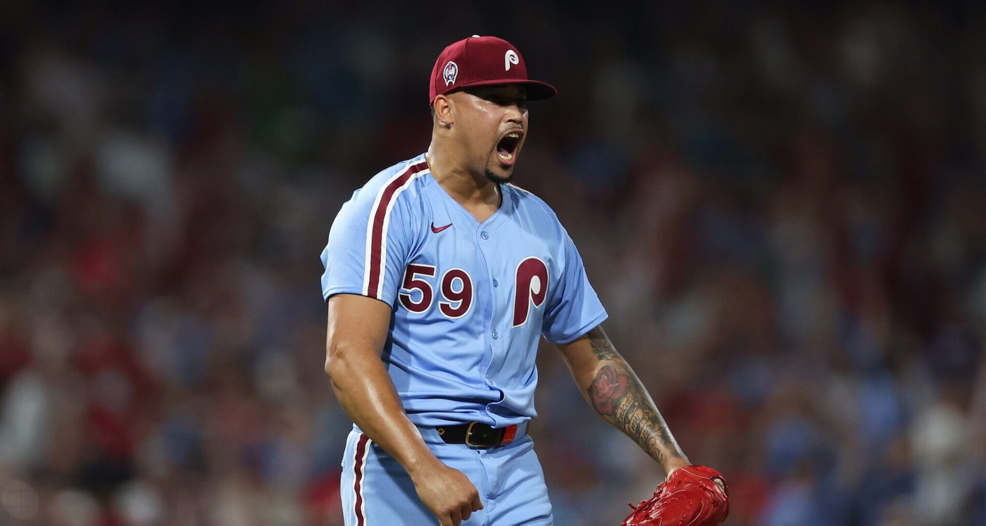 Sep 11, 2025; Philadelphia, Pennsylvania, USA; Philadelphia Phillies pitcher Jhoan Duran (59) reacts after a strike out to end the game with a win against the New York Mets at Citizens Bank Park.