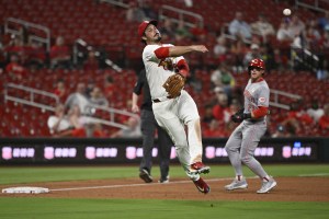Sep 15, 2025; St. Louis, Missouri, USA; St. Louis Cardinals third baseman Nolan Arenado (28) throws out Cincinnati Reds third baseman Santiago Espinal (not pictured) at first base in the eighth inning at Busch Stadium. Mandatory Credit: Joe Puetz-Imagn Images