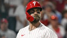 Oct 6, 2025; Philadelphia, Pennsylvania, USA; Philadelphia Phillies first baseman Bryce Harper (3) reacts to striking out against the Los Angeles Dodgers in the sixth inning during game two of the NLDS round for the 2025 MLB playoffs at Citizens Bank Park. Mandatory Credit: Eric Hartline-Imagn Images