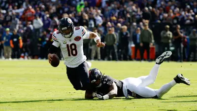 Oct 26, 2025; Baltimore, Maryland, USA; Chicago Bears quarterback Caleb Williams (18) is sacked by Baltimore Ravens linebacker Mike Green (45) during the first quarter at M&T Bank Stadium.