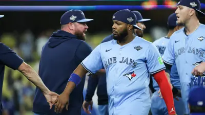 Oct 29, 2025; Los Angeles, California, USA; Toronto Blue Jays first baseman Vladimir Guerrero Jr. (27) celebrates after the game against the Los Angeles Dodgers during game five of the 2025 MLB World Series at Dodger Stadium.