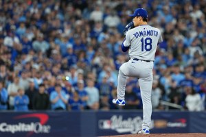 Oct 31, 2025; Toronto, Ontario, CAN; Los Angeles Dodgers pitcher Yoshinobu Yamamoto (18) throws pitch against the Toronto Blue Jays in the first inning for game six of the 2025 MLB World Series at Rogers Centre. Mandatory Credit: Nick Turchiaro-Imagn Images