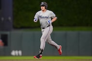 Miami Marlins' Jonah Bride (41) runs the bases after hitting a solo home run during the...