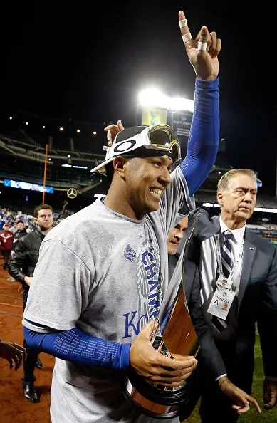NEW YORK, NY – NOVEMBER 01: Salvador Perez #13 of the Kansas City Royals celebrates with the World Series Most Valuable Player Award after defeating the New York Mets to win Game Five of the 2015 World Series at Citi Field on November 1, 2015 in the Flushing neighborhood of the Queens borough of New York City. The Kansas City Royals defeated the New York Mets with a score of 7 to 2 to win the World Series. (Photo by Sean M. Haffey/Getty Images)