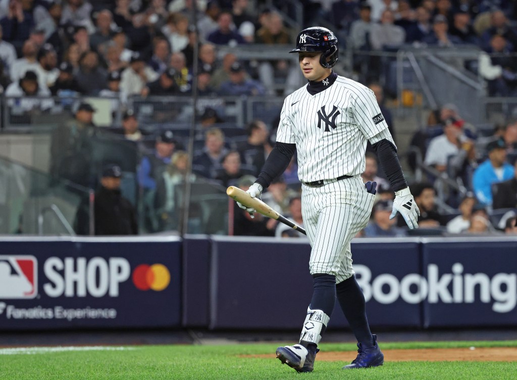 New York Yankees shortstop Anthony Volpe #11 reacts after he strikes out during the 7th inning.