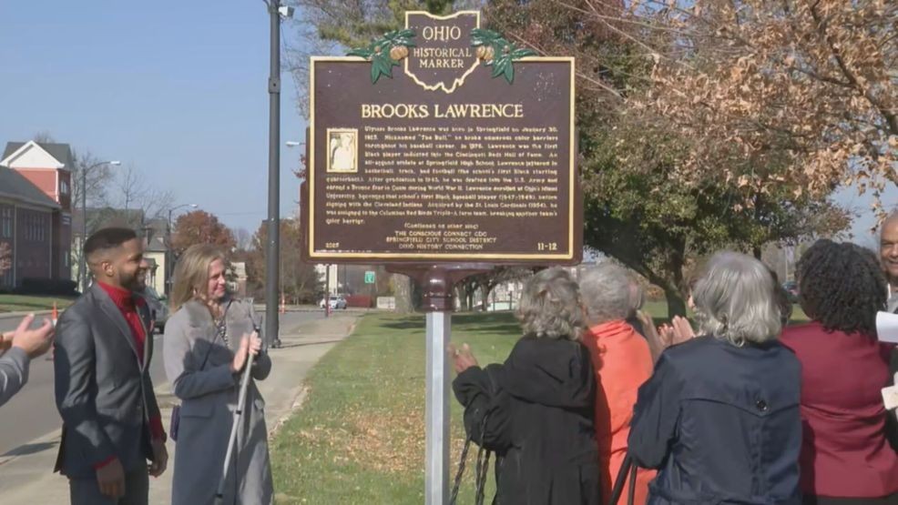 Brooks Lawrence, a pioneering athlete who broke racial barriers in football and baseball, and a Cincinnati Reds Hall of Famer, has been commemorated with an Ohio Historical Marker in his native Springfield.{ }The marker was unveiled Friday on a sidewalk near the football stadium entrance. (WKEF){ }